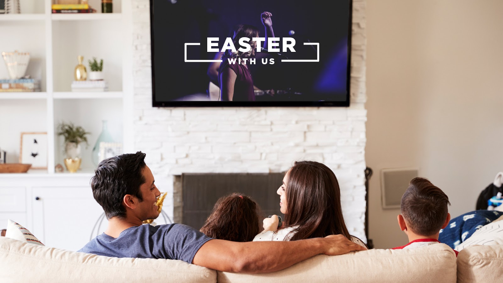 Family at home streaming a church service on their TV